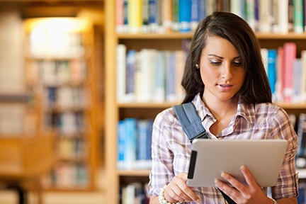 Young female student reviewing eTutoring instruction on a tablet.